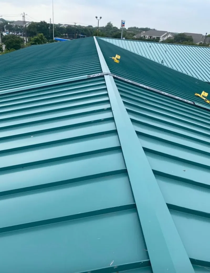 Green commercial metal roof ridge and valley for Metal Roof Repair in Creedmoor