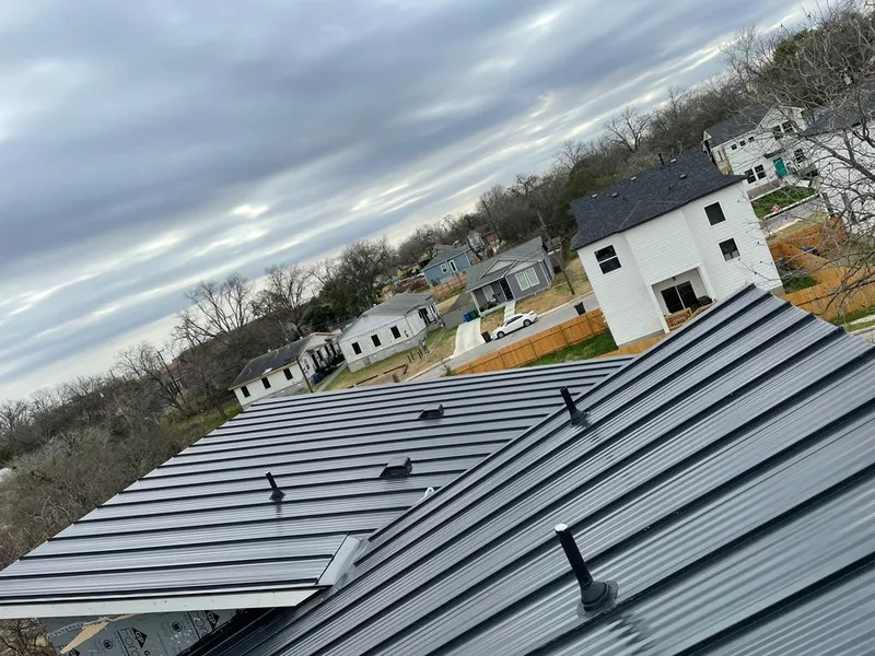 Standing seam metal roof panels with vents for Skylight Repair in Creedmoor